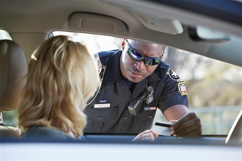 A police officer performing a traffic stop