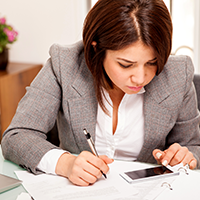 Business Professional reviewing a document