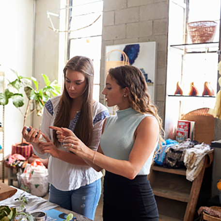 A store manager helping a customer