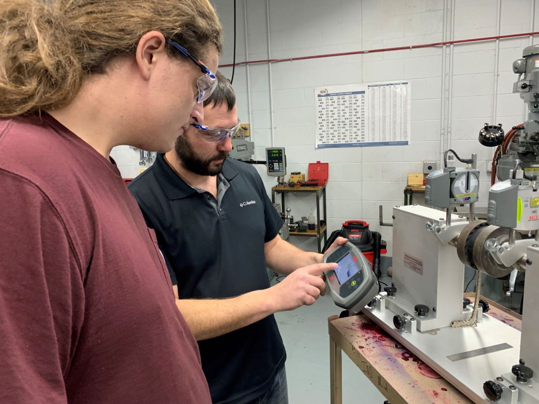 Student getting instructions from IMT instructor