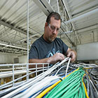 student working with wires/cables
