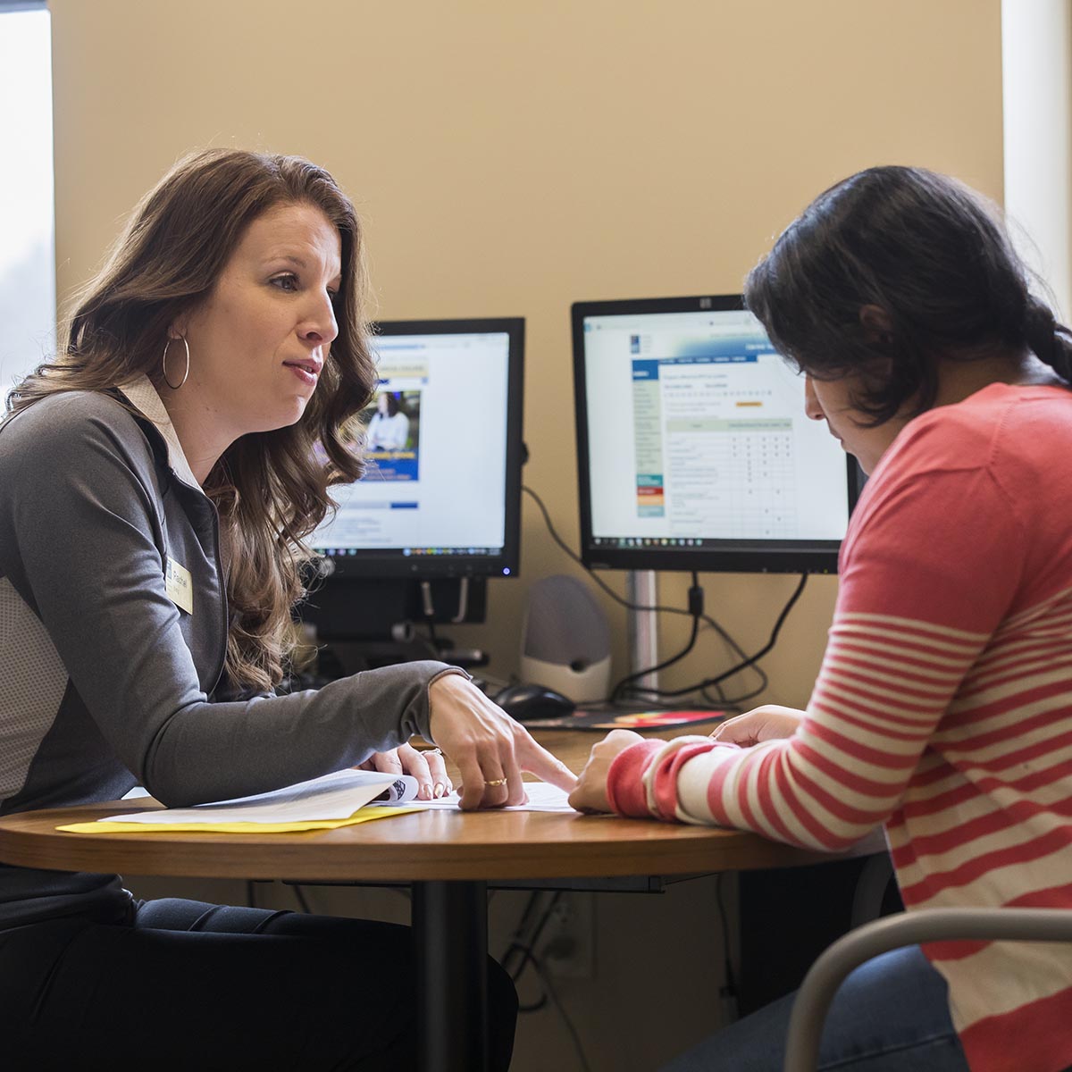 An accommodation specialist helping a student