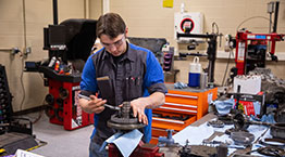 Automotive student at work in the lab