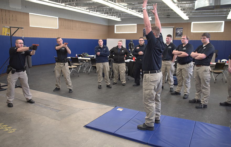 The Criminal Justice Academy students going through a simulation 