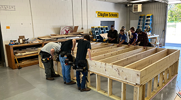 Construction Essentials students working on a project in shop