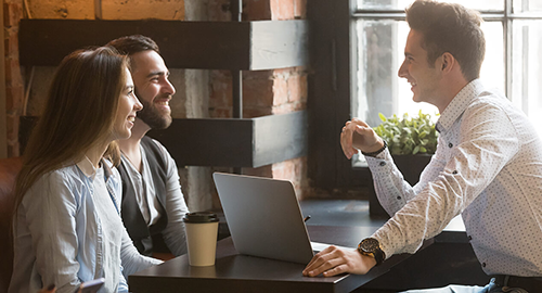 An account coordinator talking with a client