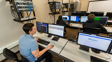 Students working on their computers in a classroom