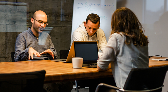 Colleagues discussing business