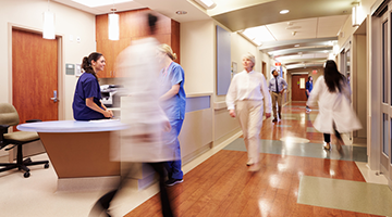 A busy front desk in a hospital