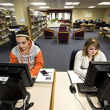 Two students working on computers