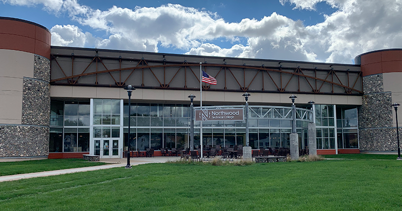 exterior of Northwood tech superior with blue sky and green grass