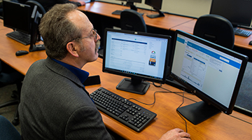 A student sitting at a computer