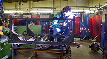 A student practicing welding skills