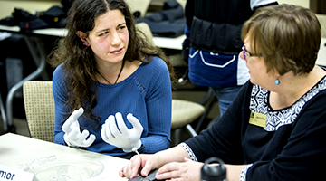 Gerontology student using the program's innovative simulation technology