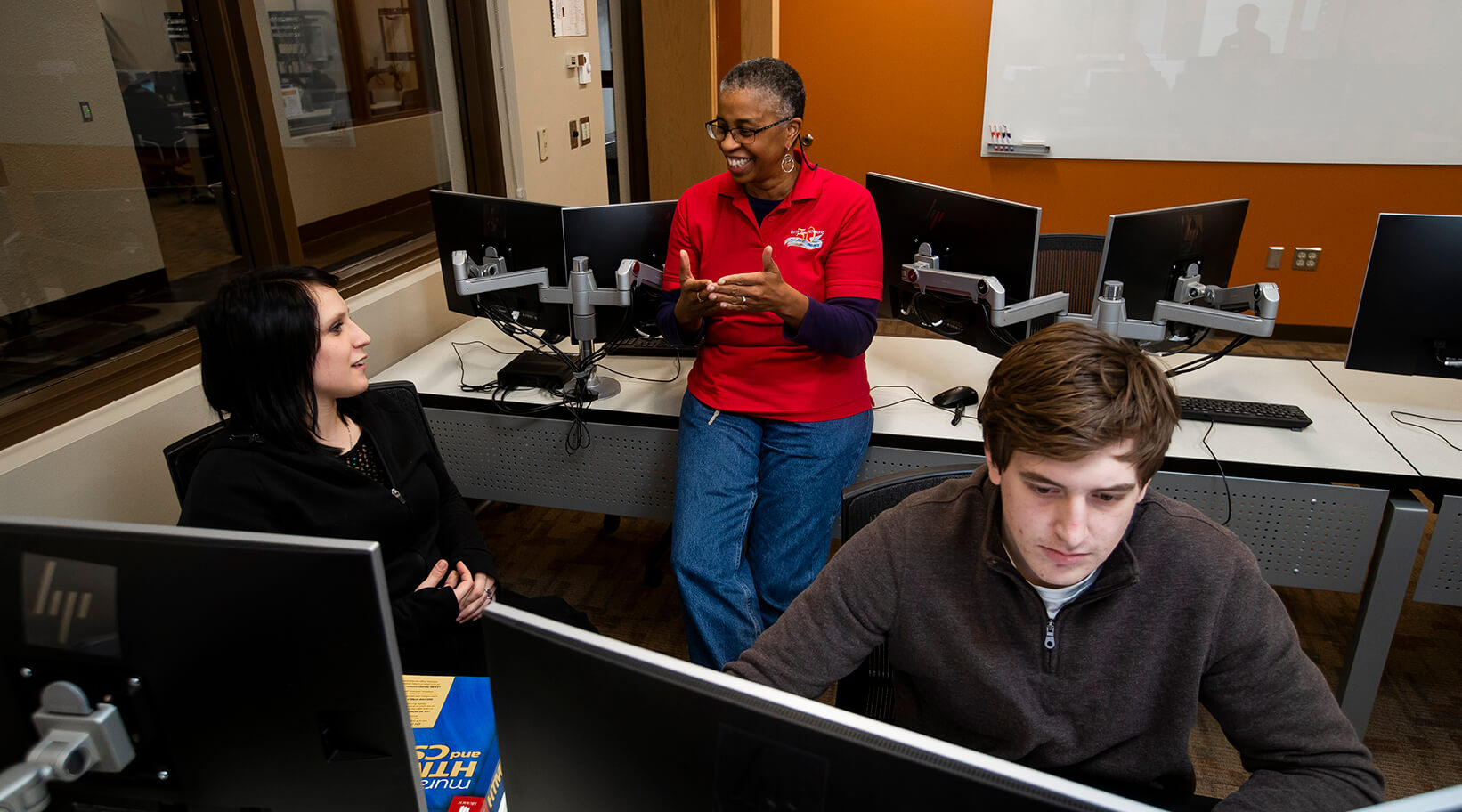 Rene Bylander working with students