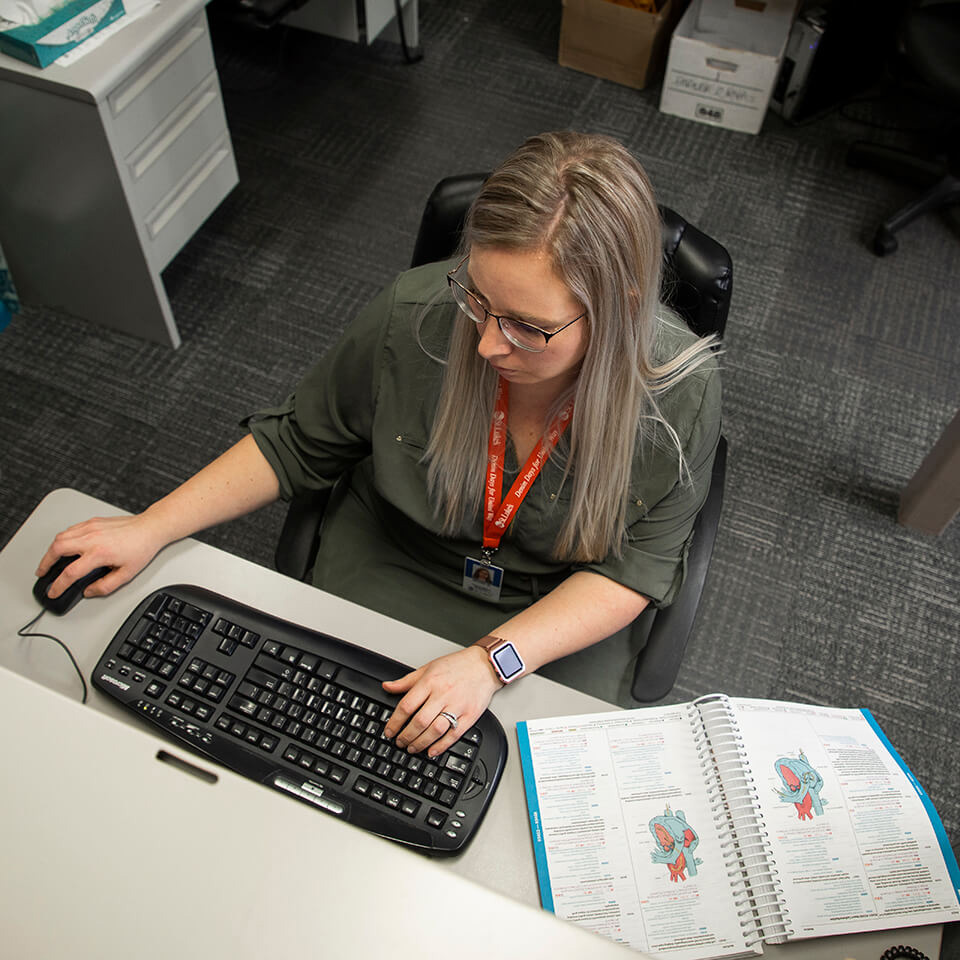 A student in the medical administrative professional program studying
