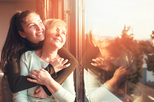 family caregiver with elderly family member