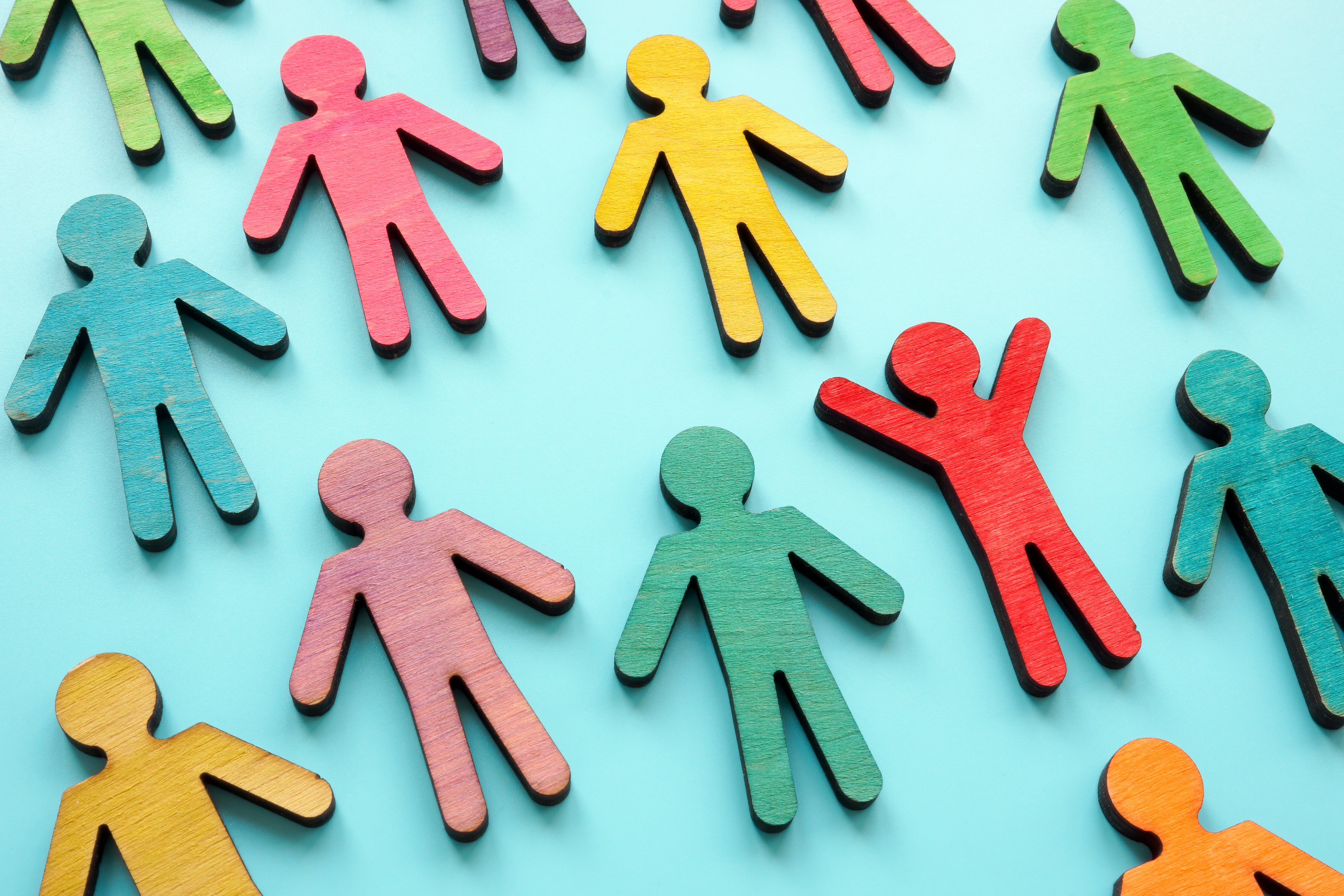Diversity and equity concept. Multi-colored figurines of people