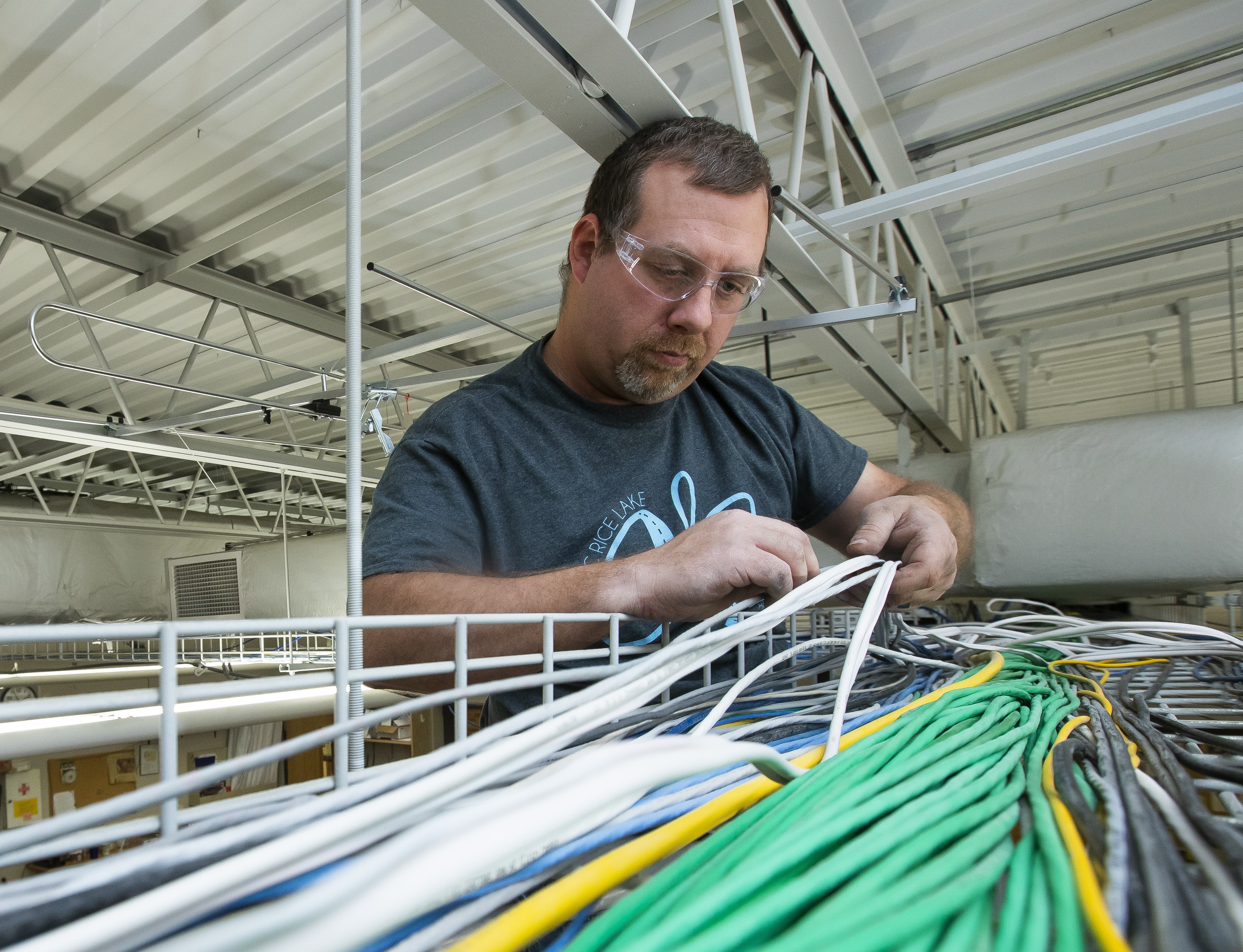 student working with wires/cables