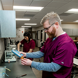 Pharm Tech student working in lab