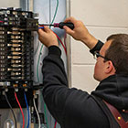 student working on wires