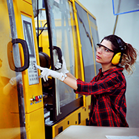 student working in injection mold lab