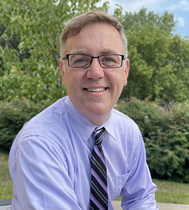 Photo of Eric Lockwood posing for camera