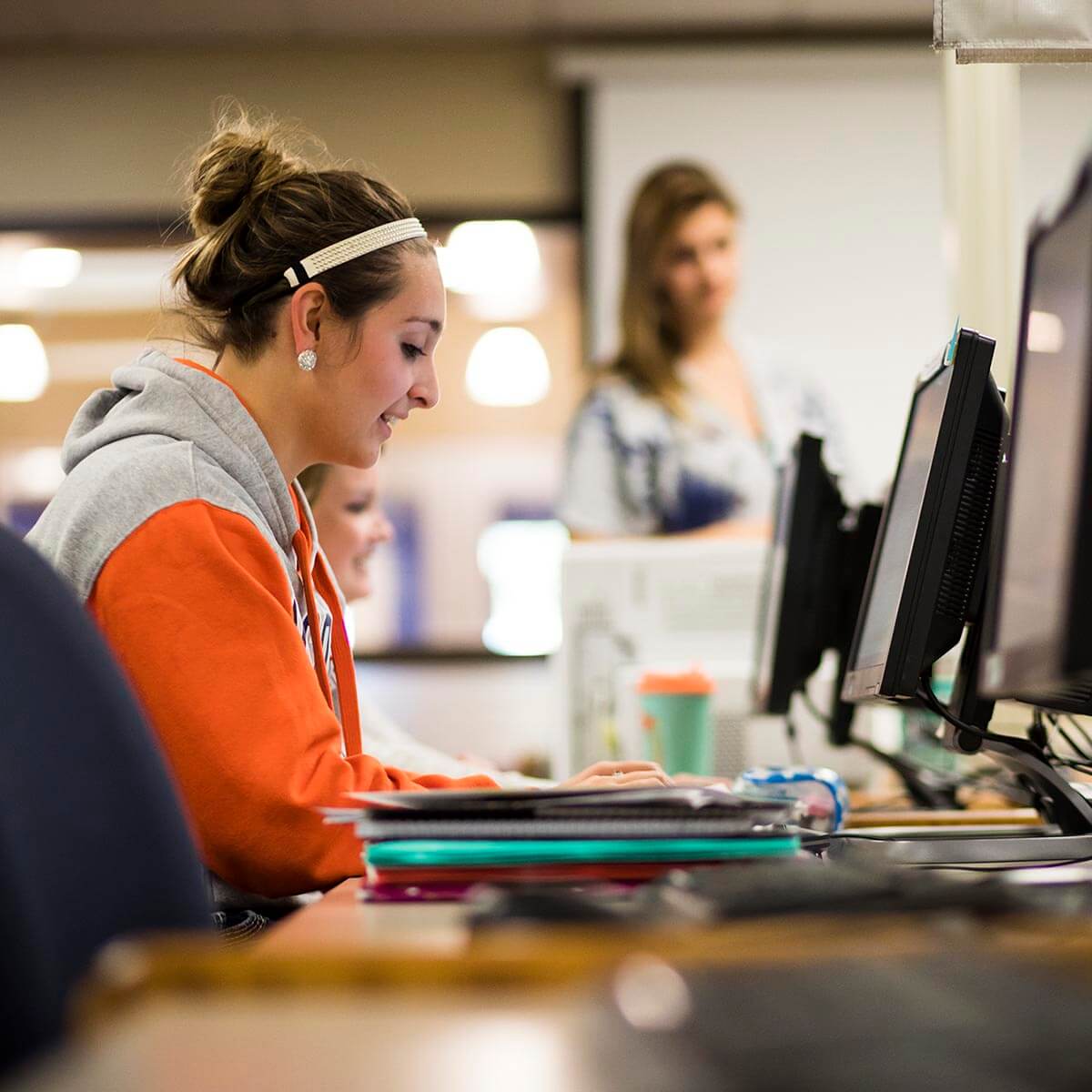 A student studying at a laptop