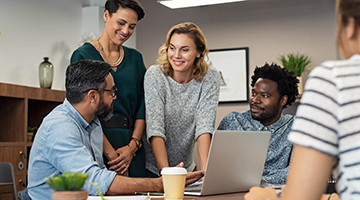 A group of colleagues working together on a project