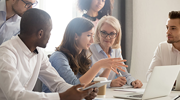 A group of business people having a discussion