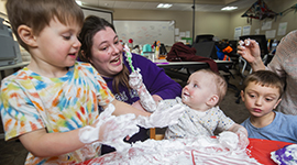 Early Childhood Education student playing with kids