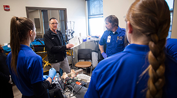 EMT students listening to the instructor