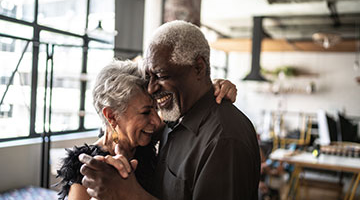 Aging couple dancing