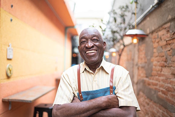 Older man smiling for camera