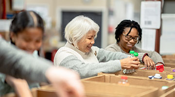 Older woman working at food bank