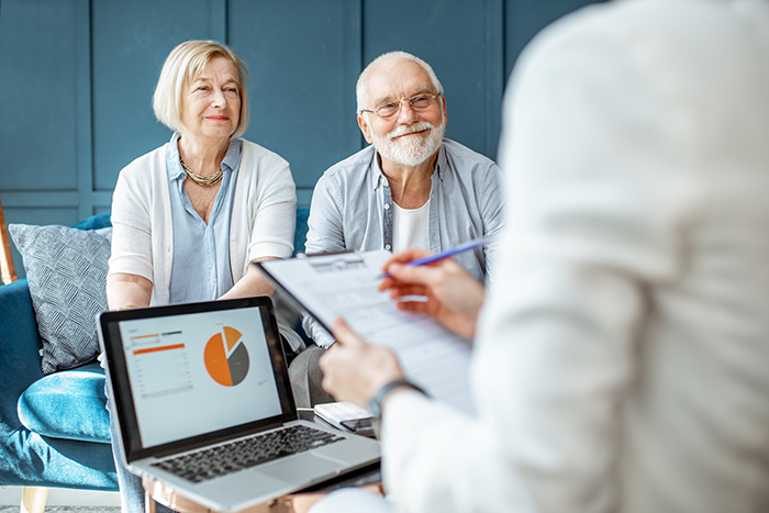 Older adults getting financial advice from a professional