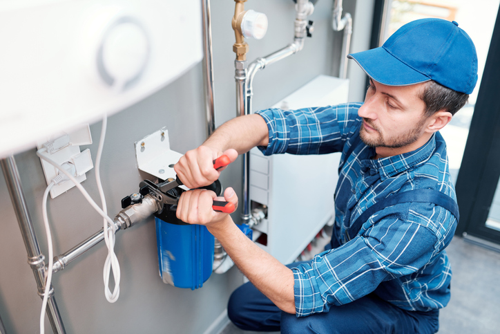 A plumber working