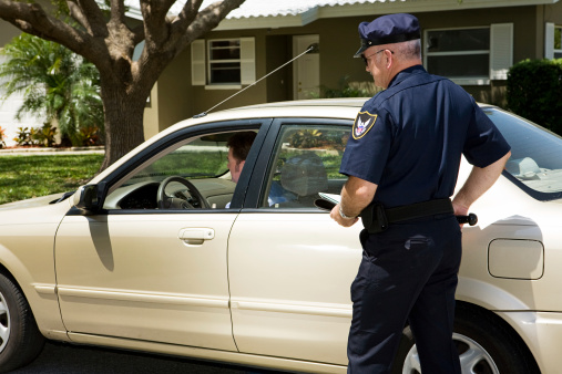 A police officer performing a traffic stop