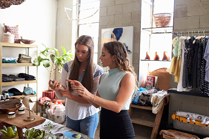 A store manager helping a customer
