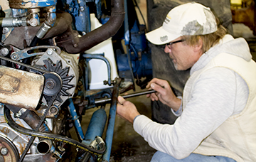 Mechanic working on a tractor