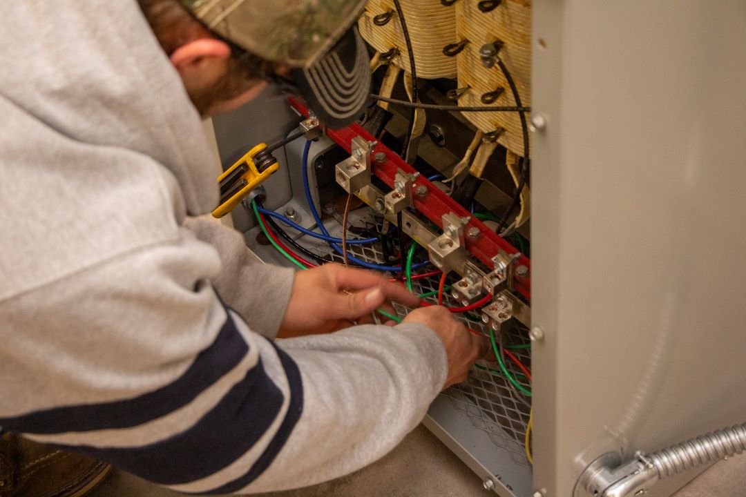 Electrician working on wires