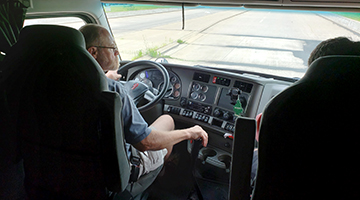 Interior view of truck with student driving