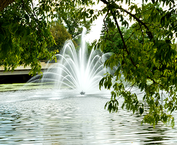 A park in New Richmond with a pond and fountain