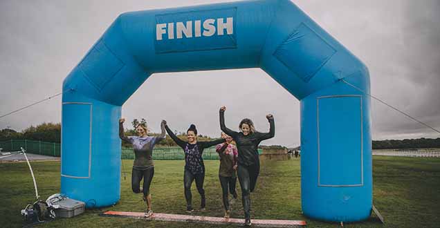 A group of people finishing a race