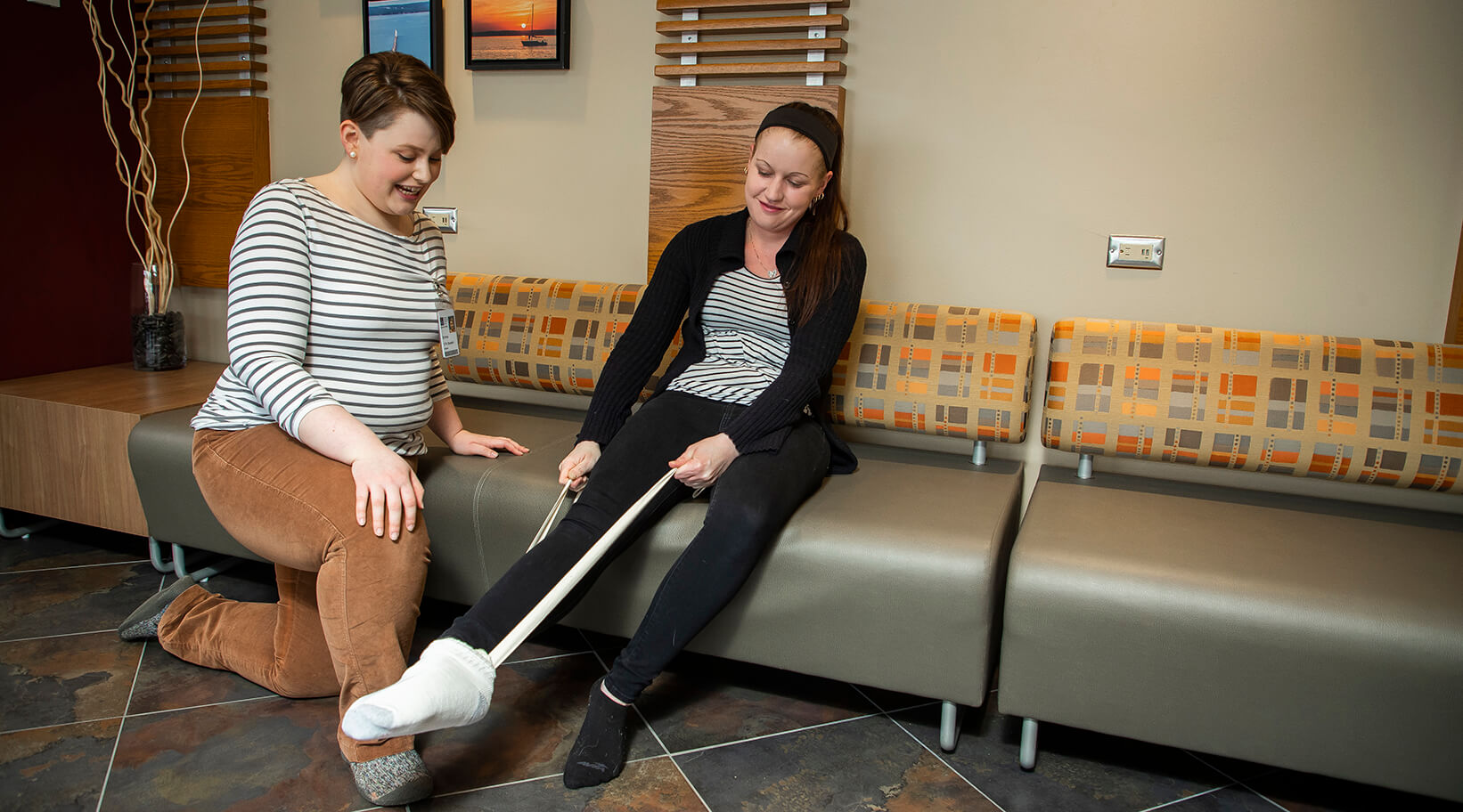 Students practicing the skills to assist someone in their home