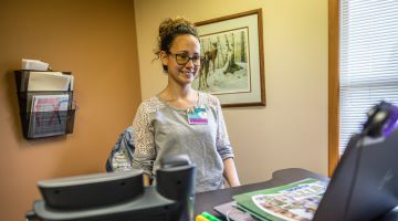 An office employee at desk