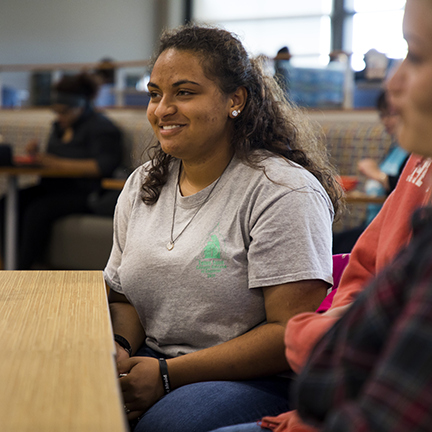 A student smiling