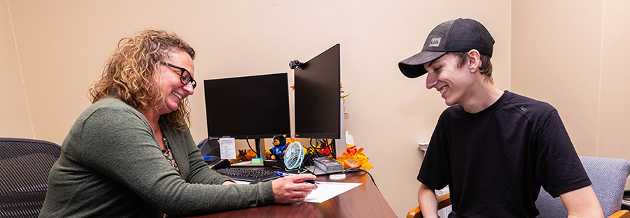 Student working with counselor