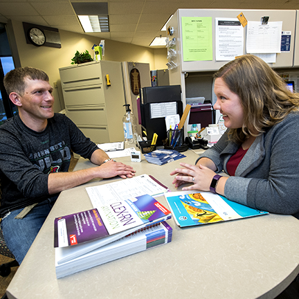 A student receiving support in student services