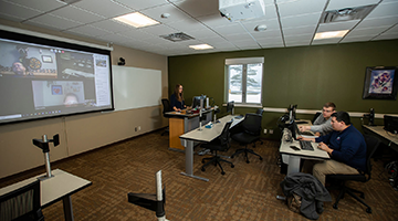 Students attending class both in person and joining remotely